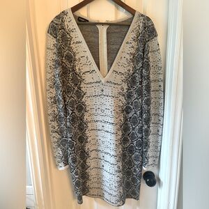Black and white snake skin print long sleeve sweater dress. Thick material.